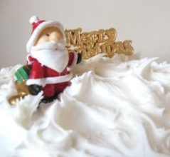 Santa almost drowning in snow and icing