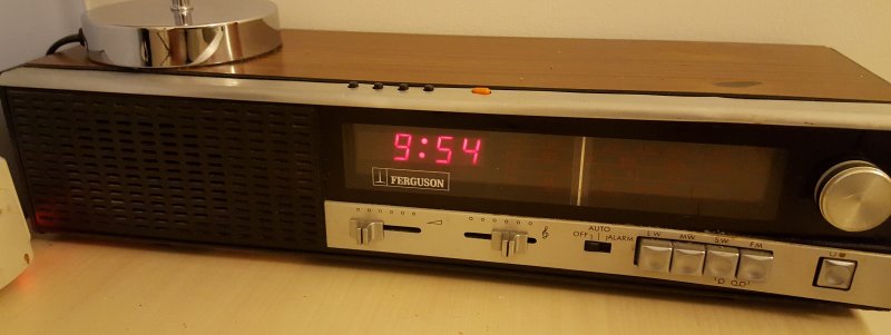 A Ferguson 3196 alarm clock radiop showing the time at 9.54pm