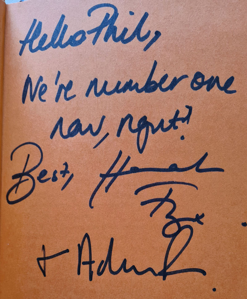 Hand writtne inscription: Hello Phil, now we're number one, right? Best wishes Hannah Fry Adam Rutherford