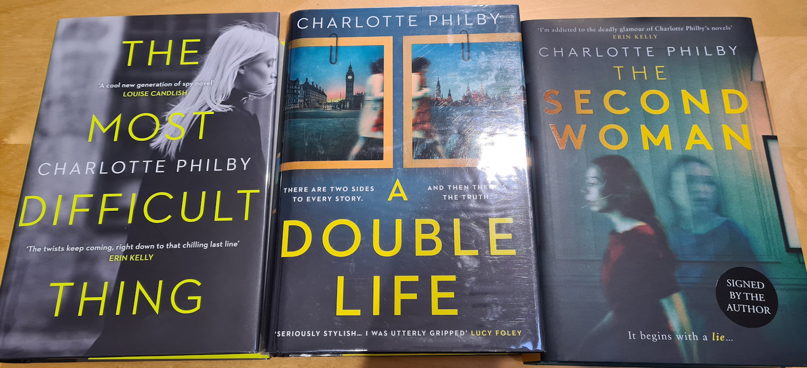Three hardback books side by side: The Most Difficult Thing, A Double Life and The Second Woman