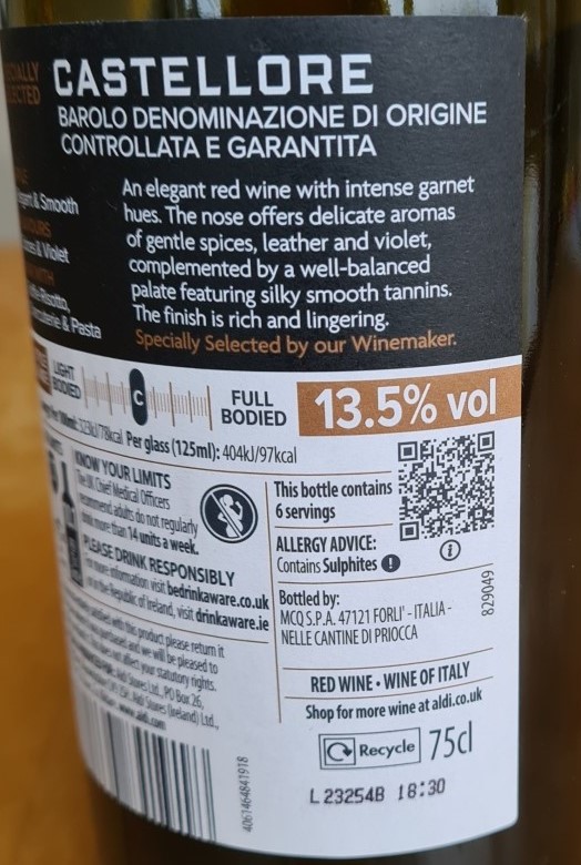 The back of a bottle of red wine. As well as tasking notes and other info, it shows the 1D barcode and a QR code