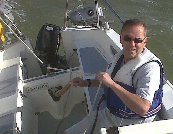 Phil Archer at the helm of Tiki.